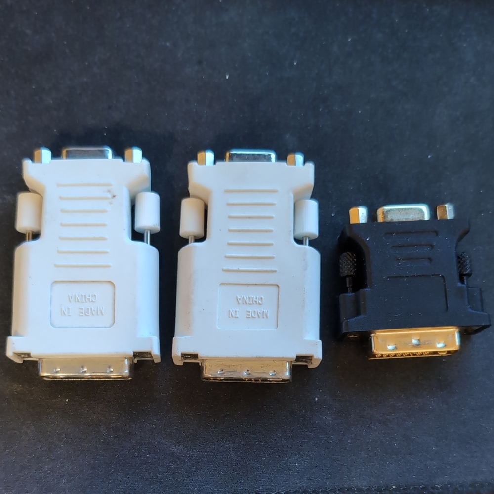 Three DVI To VGA Adapters White And Black